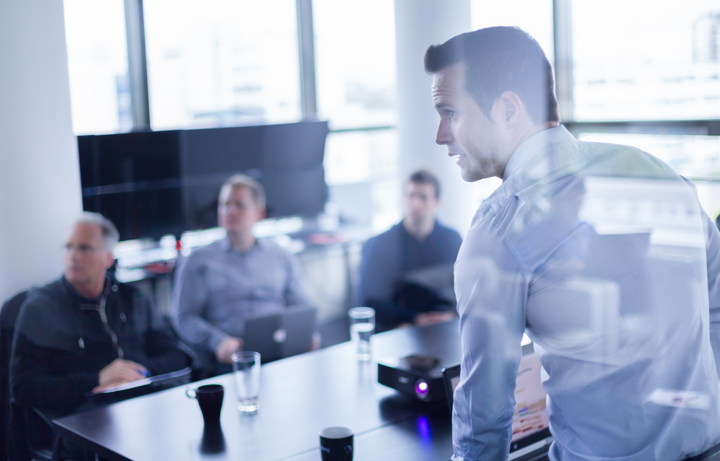 Man Giving Monthly Report