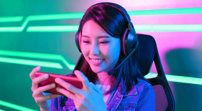 Woman Gaming On Mobile Phone